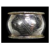 Sterling silver etched domed band with rope edges,