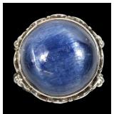 Sajen bezel set iridescent blue cabochon ring,