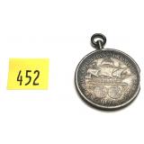 1892 Columbian half dollar in bezel