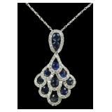 14K White gold round cut diamond and London Blue