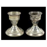 Pair of sterling silver weighted candlesticks,
