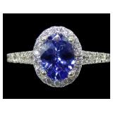 14K white gold oval cut tanzanite ring with round