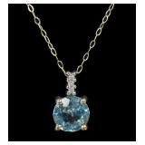 10K Yellow gold round basket set aquamarine