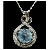 Sterling silver round cut blue topaz pendant,