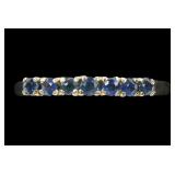 14K Yellow gold round cut blue topaz seven-stone