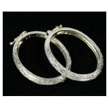 Sterlnig silver oval embossed hinged hoop