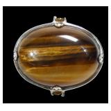 Sterling silver oval cabochon tiger eye ring with