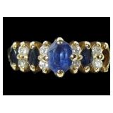 14K Yellow gold oval cut blue sapphire dome style
