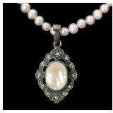 Sterling silver rose quartz and marcasite pendant