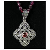 Sterling silver bezel set garnet and marcasite