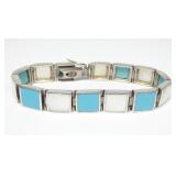 Sterling silver 7" bezel set turquoise and mother