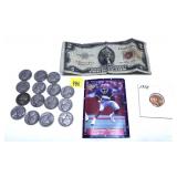 Assorted coins, currency and cards