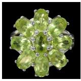 Sterling silver oval cut peridot flower ring with