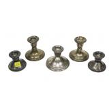 Lot, 5 sterling silver weighted candle sticks,