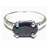 Sterling silver oval cut prong set green