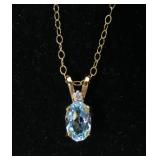 14K Yellow gold oval cut basket set blue topaz