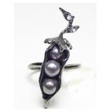 Rhodium plated freshwater pearl peapod ring.