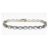 Sterling silver oval cut blue topaz 7.25" bracelet