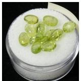 Lot, oval cut peridot, 12 pcs., 7.75 cts. t.w.