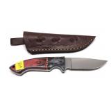 Custom handmade knife with embossed leather