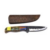 Custom handmade knife with embossed leather