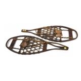 Vintage pair of wooden snowshoes,