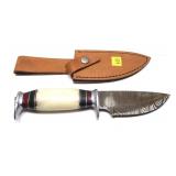 Custom Damascus blade knife with embossed