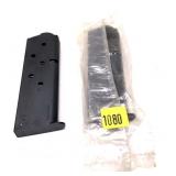 Lot: 2- .45 7 Round magazines, marked "Made in