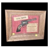 Framed shadowbox with .45 Cal. Frontier