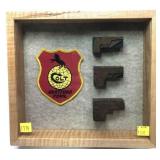 Shadow box with Colt patch and 3 metal Colt