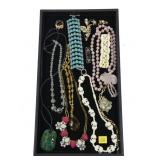 Lot, vintage jewelry, including carved and