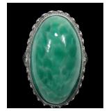 Sterling silver bezel set cabochon green stone