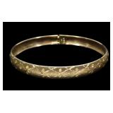 10K Yellow gold flexible clasped bangle bracelet,