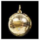 14K Yellow gold world globe pendant with diamond