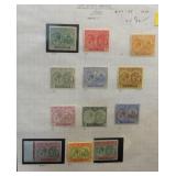 St. Kitts-Nevis 24-35 MH on homemade album page,