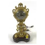 United Electric Clock inserted on Cast Metal