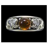 Sterling silver prong set amber elephant motif