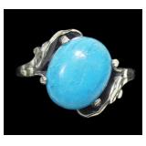 Sterling silver prong set turquoise ring in bypass
