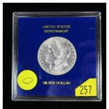 1881-O Morgan dollar in U.S. Government holder,