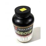 Bottle Hodgon Tite Group powder, 18.15 ounces