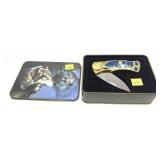 Decorative wolf folding knife in tin