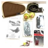 Lot: Speed loaders, pistol case, bore snakes and