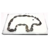 Collection of Native American stone arrow heads,