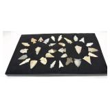 Collection of Native American stone arrow heads,