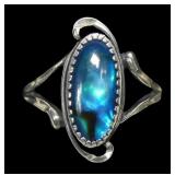 Sterling silver dentil set blue paua ring in split