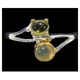 Sterling silver claw and bezel set cabochon opal