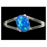 Sterling silver prong set lab blue opal ring in