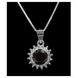 Sterling silver round cut garnet pendant with