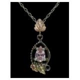 Sterling silver and 10K bicolor gold pendant with