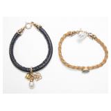 Lot, two 7.75' leather bracelets with sterling